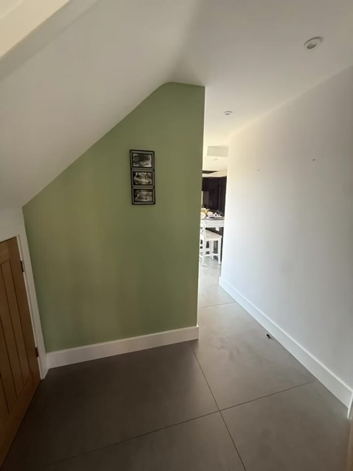 After: Hallway entrance before and after painting