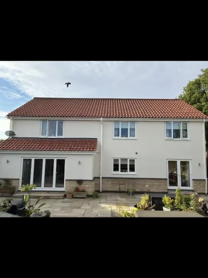 Completed rendered house exterior repainting