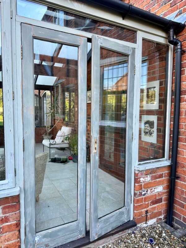 Before: Glazed porch doors before and after repainting