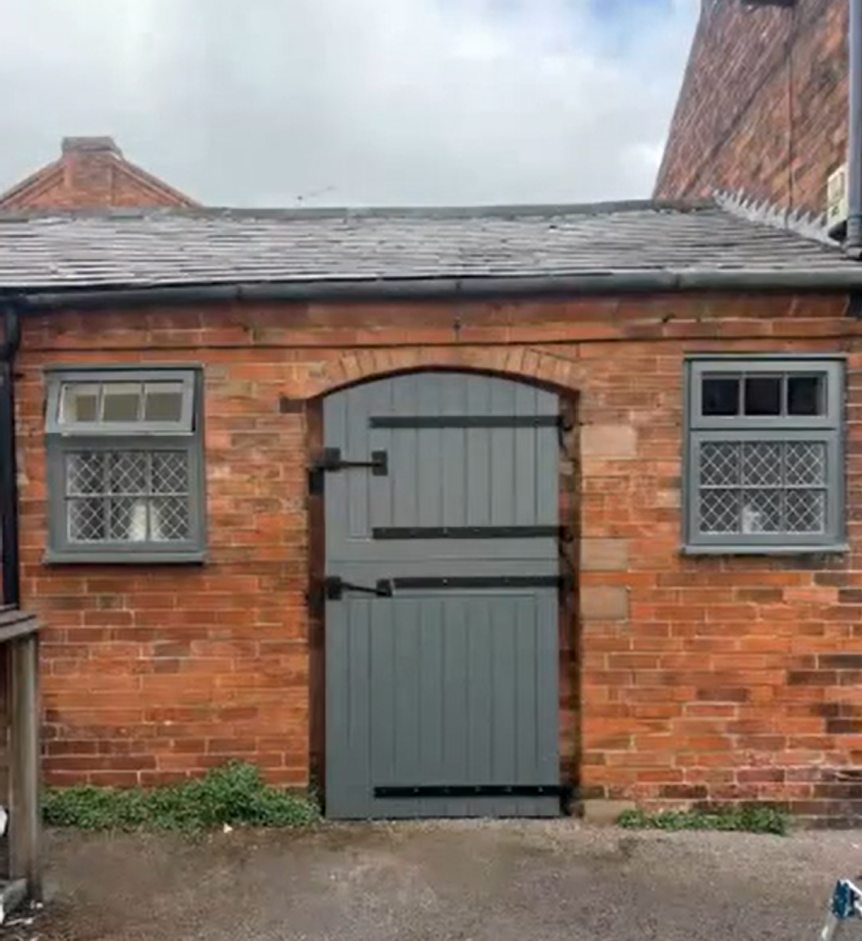 After: Barn side door before and after repainting