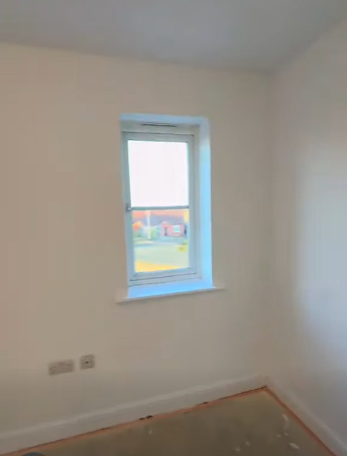 After: Window wall before and after peeling paint repair